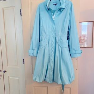 Aqua blue water resistant coat with flounce bottom… never worn